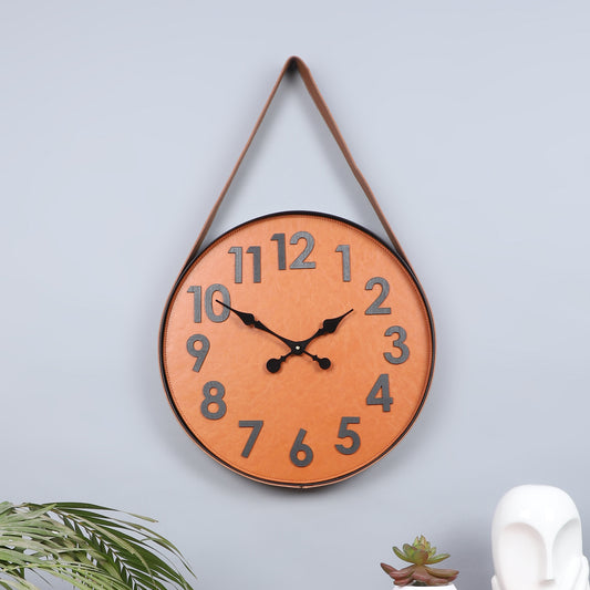 brown numerical belt wall clock