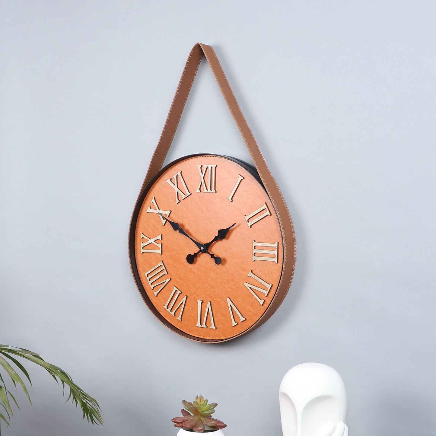 Brown roman leather belt wall clock